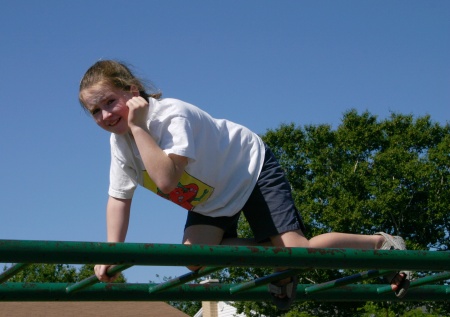Emily on the monkey bars